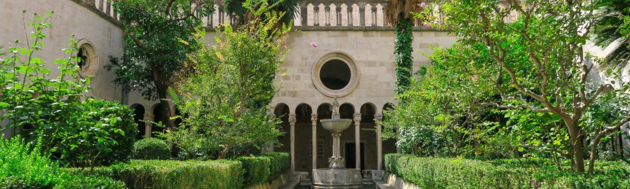 A pretty walkway leading to Franciscan Monastery, which houses Dubrovnik's Medieval Pharmacy.