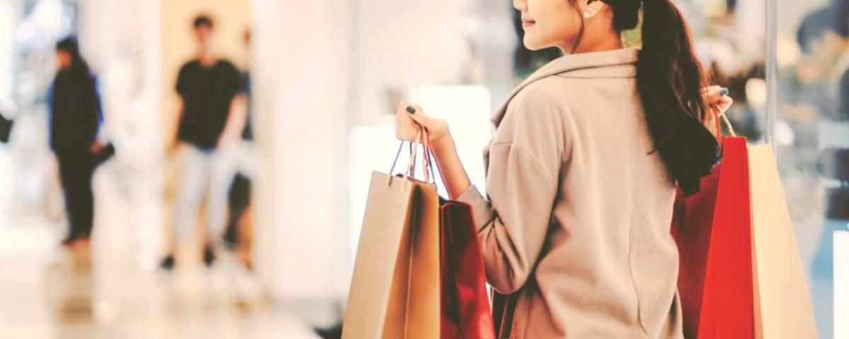 Woman shopping in an indoor shopping centre